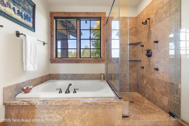 500 E Buckwheat Cir, Jackson, WY 83001 - full bathroom with a bath and a tile shower
