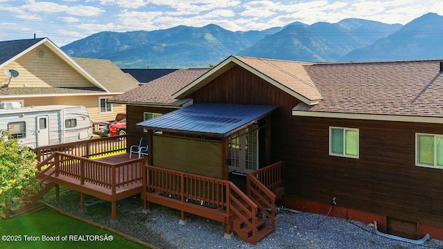 158 Holly Dr, Star Valley Ranch, WY 83127 - rear view of house featuring a shingled roof and a deck with mountain view