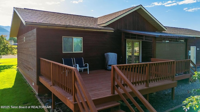 158 Holly Dr, Star Valley Ranch, WY 83127 - rear view of house with a wooden deck, a shingled roof, french doors, and a lawn