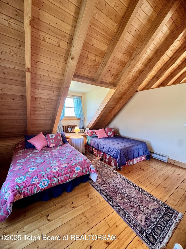 109 E Fontenelle Dr, Daniel, WY 83115 - bedroom featuring baseboard heating, hardwood / wood-style floors, and wooden ceiling