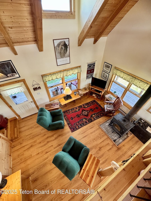 109 E Fontenelle Dr, Daniel, WY 83115 - living area featuring a high ceiling, wood finished floors, beam ceiling, and plenty of natural light