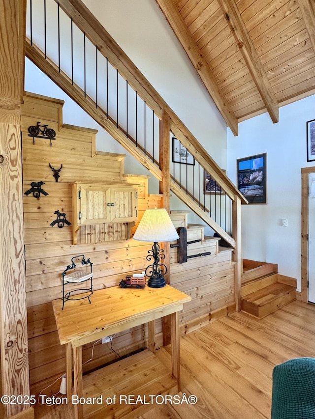 109 E Fontenelle Dr, Daniel, WY 83115 - staircase with a wooden ceiling with exposed beams, wood finished floors, and high vaulted ceiling