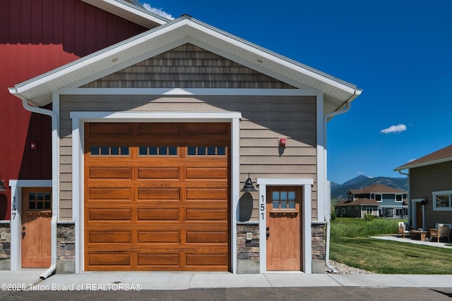 151 Stonefly Ln, Swan Valley, ID 83449 - garage featuring a mountain view