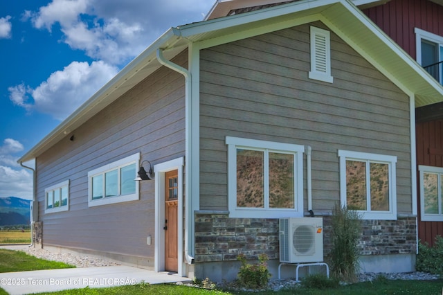 151 Stonefly Ln, Swan Valley, ID 83449 - rear view of house with stone siding