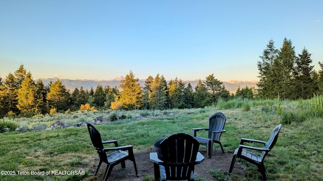 8157 Ripplinger Rd, Driggs, ID 83422 - yard at dusk featuring a mountain view