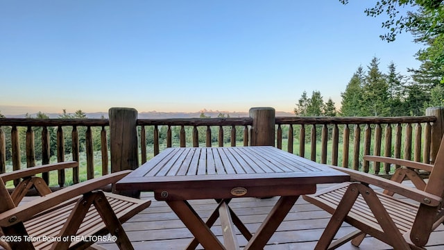 8157 Ripplinger Rd, Driggs, ID 83422 - deck at dusk featuring outdoor dining area