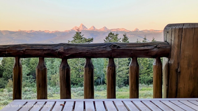 8157 Ripplinger Rd, Driggs, ID 83422 - deck at dusk with a mountain view
