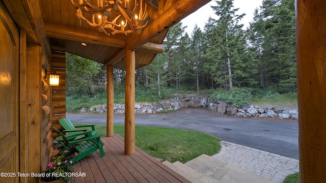 8157 Ripplinger Rd, Driggs, ID 83422 - wooden deck with a patio area