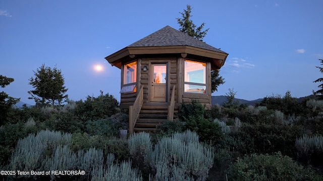 8157 Ripplinger Rd, Driggs, ID 83422 - view of front of home featuring a shingled roof and entry steps