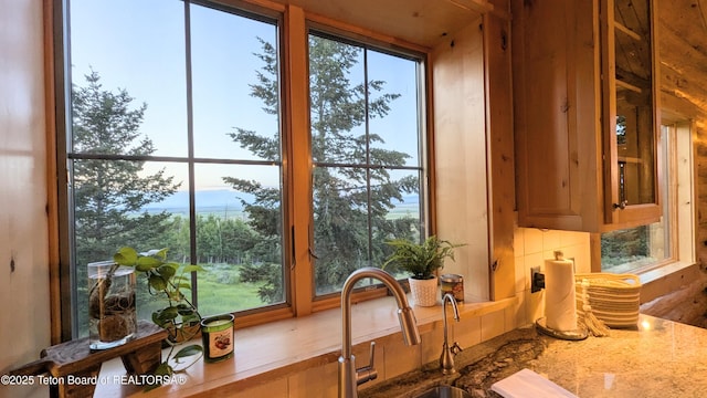 8157 Ripplinger Rd, Driggs, ID 83422 - kitchen view of tasteful backsplash and brown cabinets