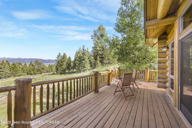 8157 Ripplinger Rd, Driggs, ID 83422 - wooden terrace with a mountain view