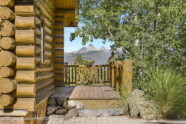 8157 Ripplinger Rd, Driggs, ID 83422 - wooden terrace featuring a mountain view