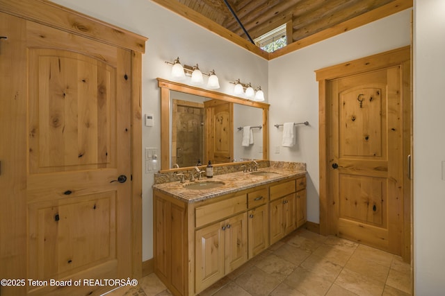 8157 Ripplinger Rd, Driggs, ID 83422 - bathroom featuring double vanity, wooden ceiling, and a high ceiling