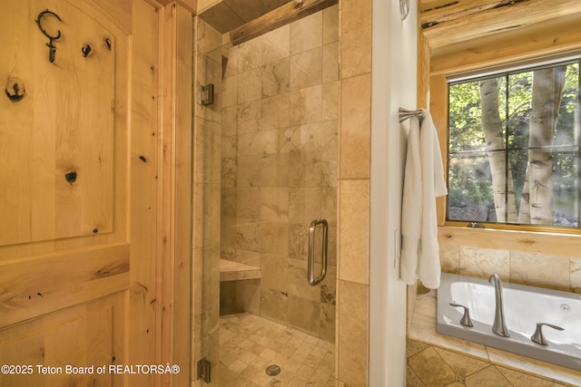 8157 Ripplinger Rd, Driggs, ID 83422 - bathroom featuring a garden tub and a stall shower