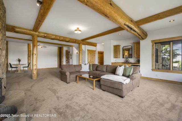 8157 Ripplinger Rd, Driggs, ID 83422 - living area with light colored carpet, beam ceiling, and recessed lighting