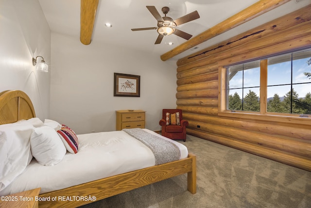 8157 Ripplinger Rd, Driggs, ID 83422 - bedroom with log walls, beam ceiling, carpet floors, recessed lighting, and ceiling fan