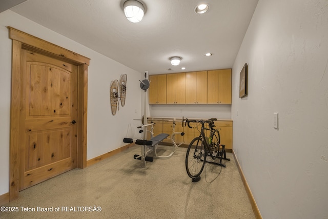 8157 Ripplinger Rd, Driggs, ID 83422 - exercise room featuring baseboards and recessed lighting