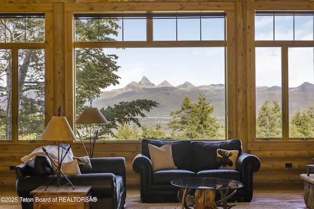 8157 Ripplinger Rd, Driggs, ID 83422 - living room featuring a mountain view and wood finished floors