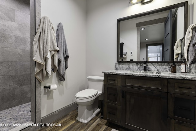 42 Airport Rd, Afton, WY 83110 - full bath featuring vanity, walk in shower, and wood finished floors
