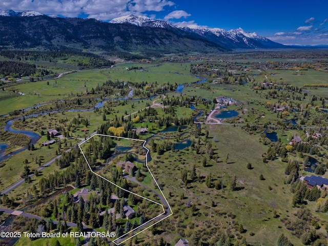 590 S Sandhill Crane Rd, Wilson, WY 83014 - aerial view of property's location featuring property boundaries highlighted and a water and mountain view