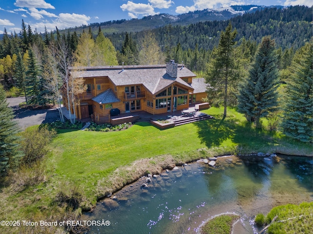590 S Sandhill Crane Rd, Wilson, WY 83014 - view from above of property with a heavily wooded area and mountains