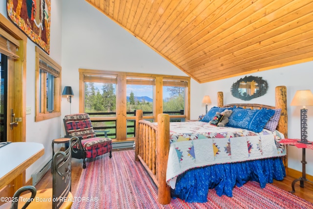 590 S Sandhill Crane Rd, Wilson, WY 83014 - bedroom featuring high vaulted ceiling, a baseboard heating unit, wood finished floors, wood ceiling, and a mountain view