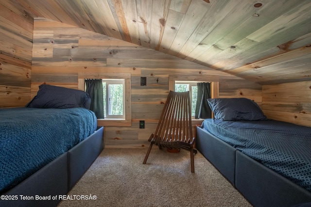 66 Elkhorn Dr, Thayne, WY 83127 - bedroom featuring vaulted ceiling, wooden walls, multiple windows, wood ceiling, and carpet floors