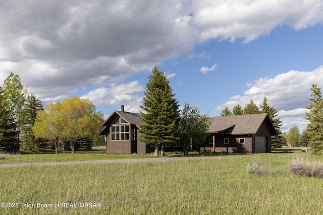 6790 N Timothy Rd, Jackson, WY 83001 - chalet / cabin with a garage