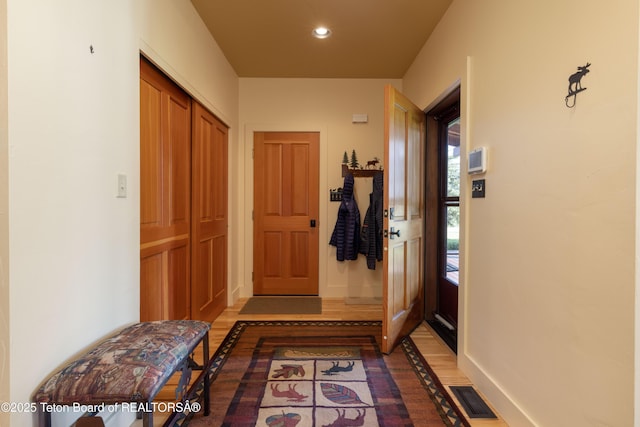 6790 N Timothy Rd, Jackson, WY 83001 - doorway with light wood-style floors and recessed lighting