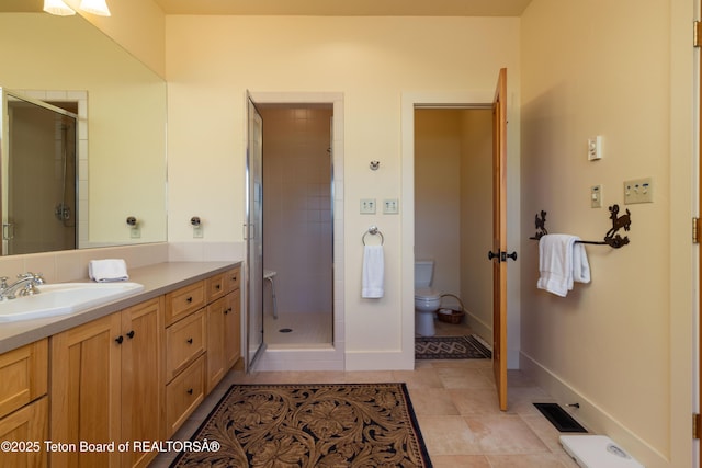 6790 N Timothy Rd, Jackson, WY 83001 - full bath featuring vanity, a stall shower, and tile patterned floors