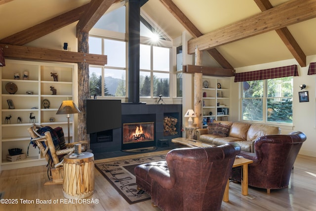 6790 N Timothy Rd, Jackson, WY 83001 - living area with wood finished floors and a tile fireplace