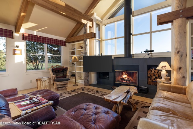 6790 N Timothy Rd, Jackson, WY 83001 - living area with beam ceiling and high vaulted ceiling