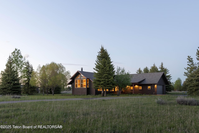 6790 N Timothy Rd, Jackson, WY 83001 - chalet / cabin with an attached garage