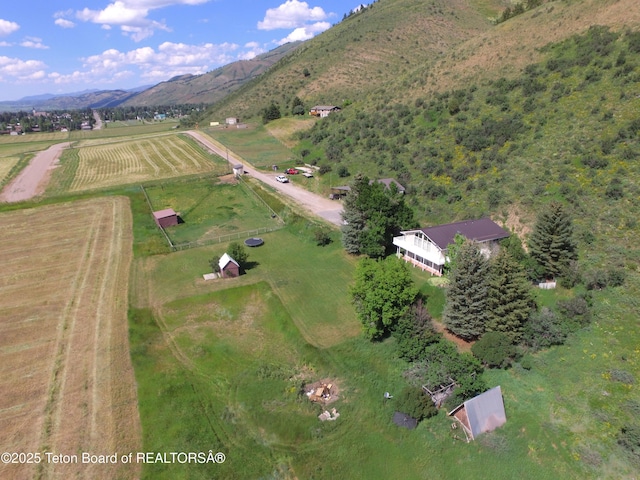 870 Sky View Ln, Afton, WY 83110 - aerial overview of property's location with rural landscape and a mountainous background