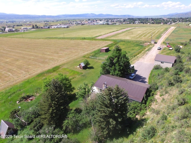 870 Sky View Ln, Afton, WY 83110 - overview of rural landscape with a mountain backdrop and extensive farmland