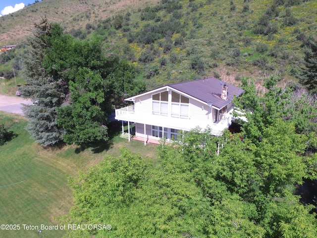 870 Sky View Ln, Afton, WY 83110 - view from above of property with a heavily wooded area