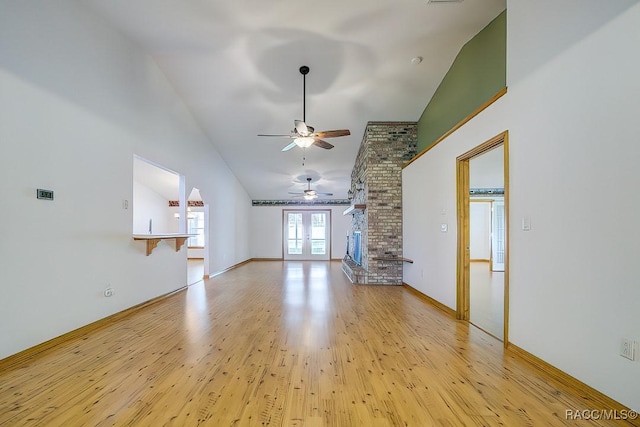 2195 W Huntington Dr, Beverly Hills, FL 34465 - unfurnished living room with ceiling fan, light wood-type flooring, and high vaulted ceiling