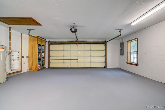 2195 W Huntington Dr, Beverly Hills, FL 34465 - garage featuring electric water heater, electric panel, and a garage door opener