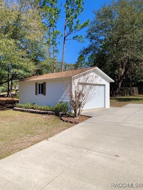 2195 W Huntington Dr, Beverly Hills, FL 34465 - garage with driveway