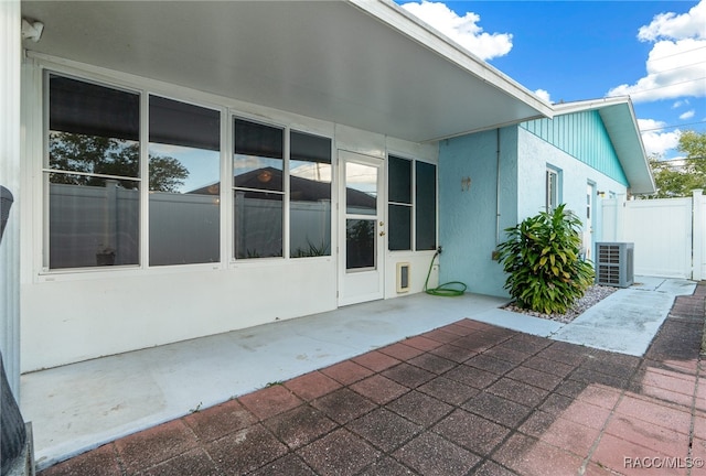 exterior space featuring central AC and a patio