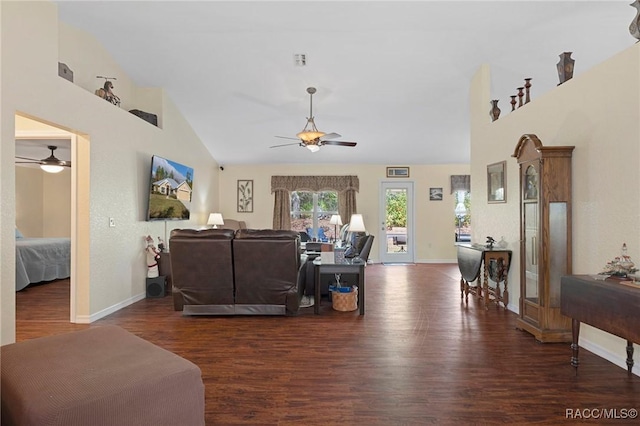 living room with vaulted ceiling, ceiling fan, and dark hardwood / wood-style floors