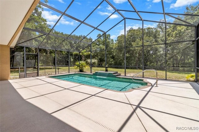8583 N Tibet Ter, Dunnellon, FL 34433 - swimming pool with a patio, a lanai, and a lawn