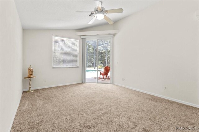 8583 N Tibet Ter, Dunnellon, FL 34433 - carpeted empty room featuring ceiling fan and vaulted ceiling