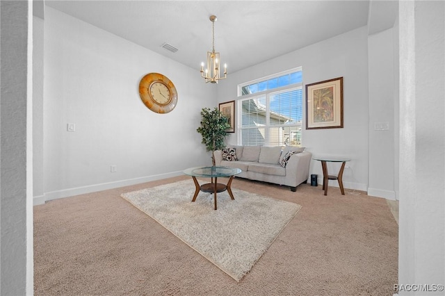 living room featuring a chandelier and carpet flooring