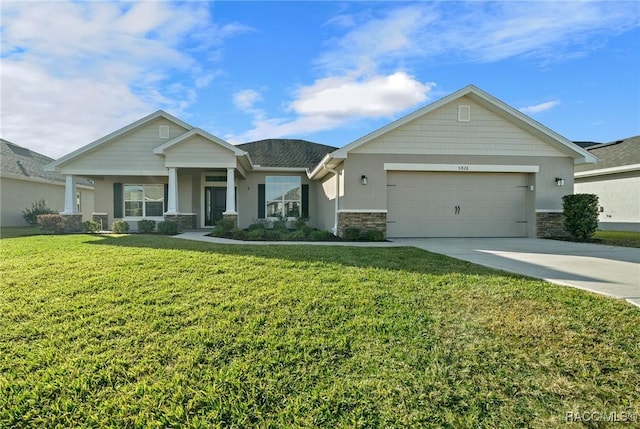 craftsman inspired home with a front lawn, a porch, and a garage