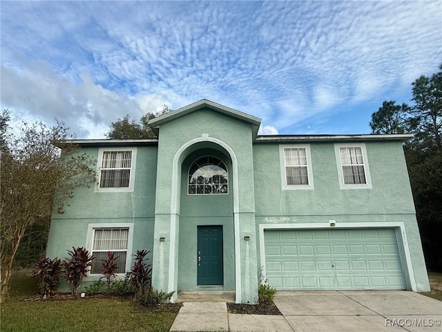 front facade with a garage