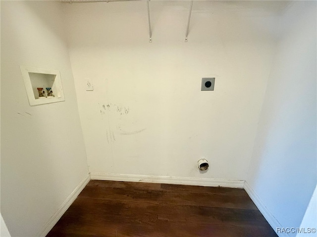 clothes washing area featuring hookup for an electric dryer, dark hardwood / wood-style floors, and washer hookup