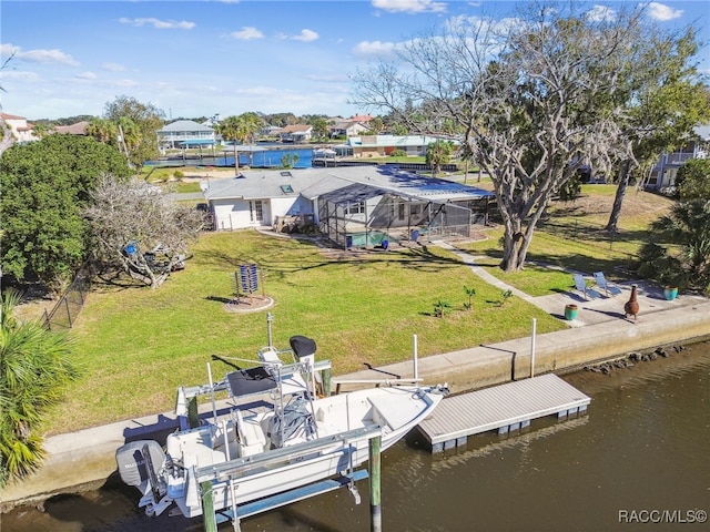 dock area featuring a lawn, glass enclosure, and a water view