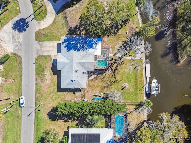 bird's eye view with a water view