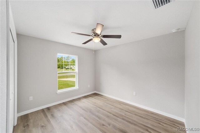 397 W Homeway Loop, Citrus Springs, FL 34434 - empty room with baseboards, ceiling fan, light wood-style flooring, and visible vents